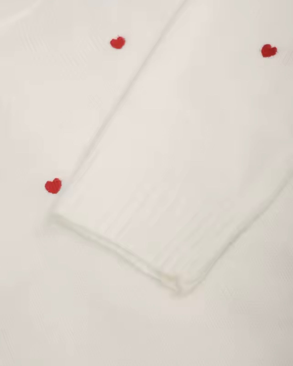 Suéter Corazones